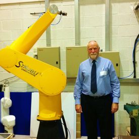 Staubli 6 Axis Robot Joins AKI Team - Managing Director, Allen Green with RX130 Robot